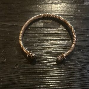 Elegant Gold and Silver Twisted Bracelet